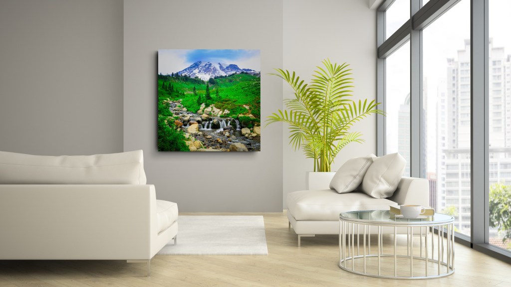 A beautiful fine art nature photograph print of Mt. Rainier with waterfall in a home with white wall