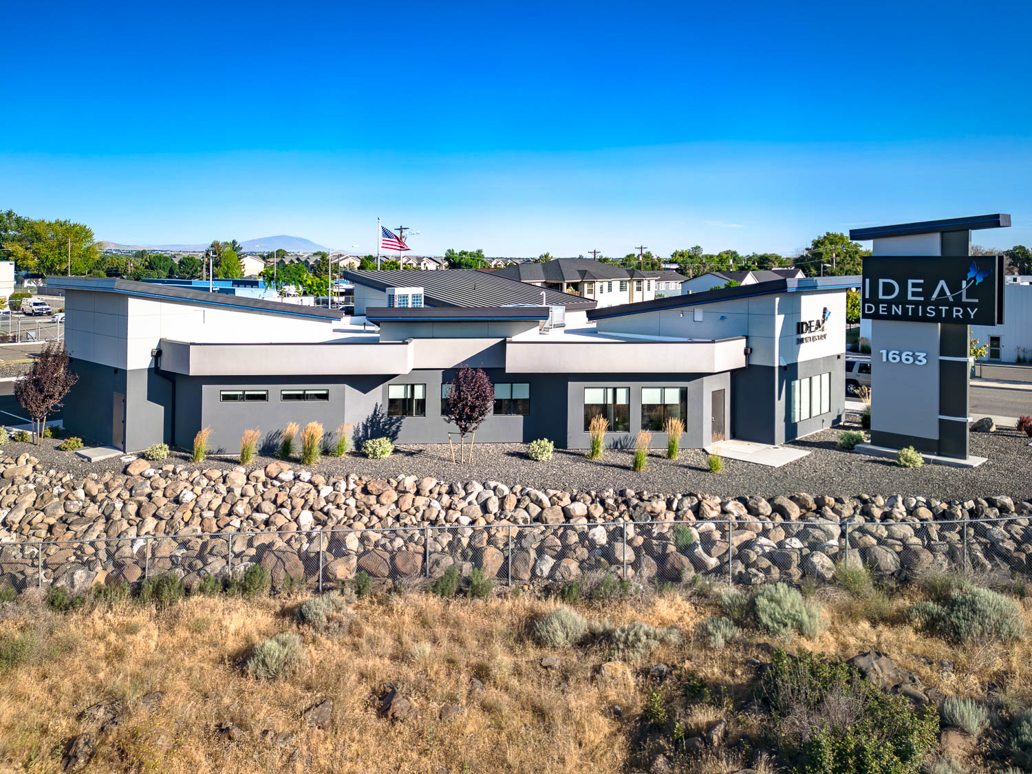 Exterior area of IDEAL DENTISTRY, a modern dental clinic in Richland, WA. Commercial photographer by Kiss of Heaven Photography.