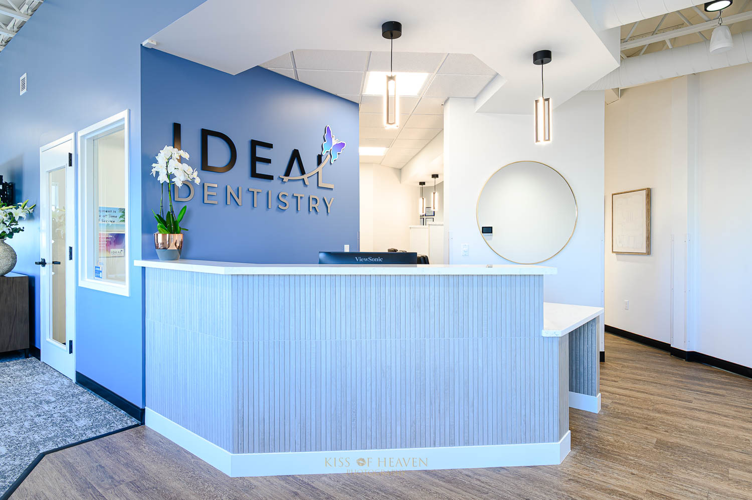 Interior of Front desk area of IDEAL DENTISTRY, a modern dental clinic in Richland, WA. Commercial photographer by Kiss of Heaven Photography.