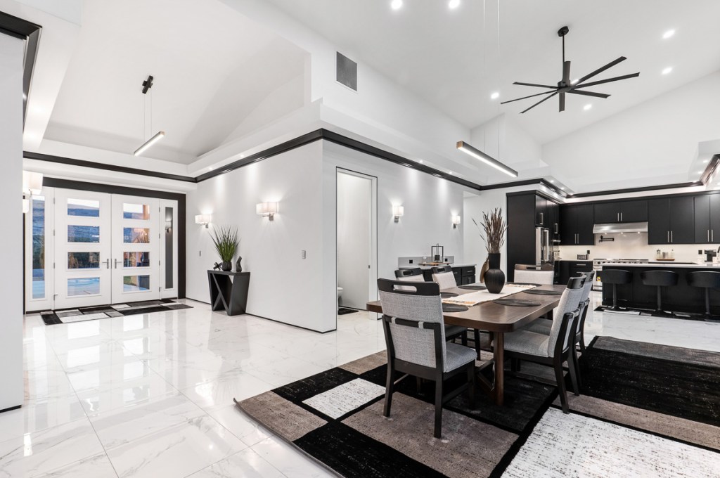 Premium shooting and edit of luxury interior showing view outside and bright edits of living room by Kiss of Heaven Photography.